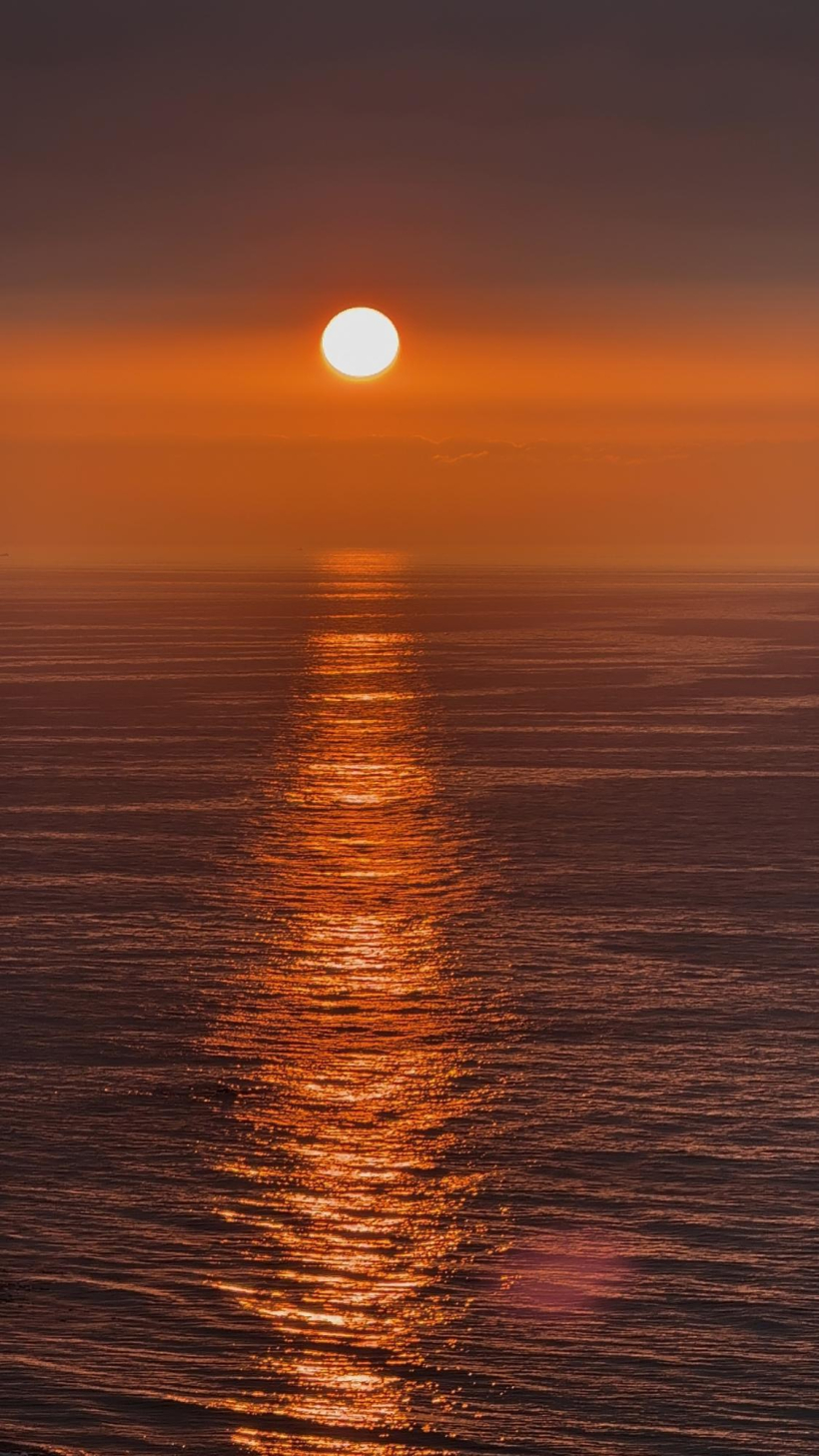 Puesta de sol en Caión tras el eclipse
